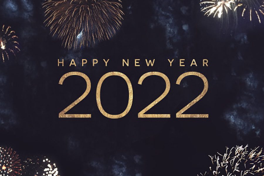Happy New Year 2022 Text Holiday Celebration Graphic with Gold Fireworks Background in Night Sky